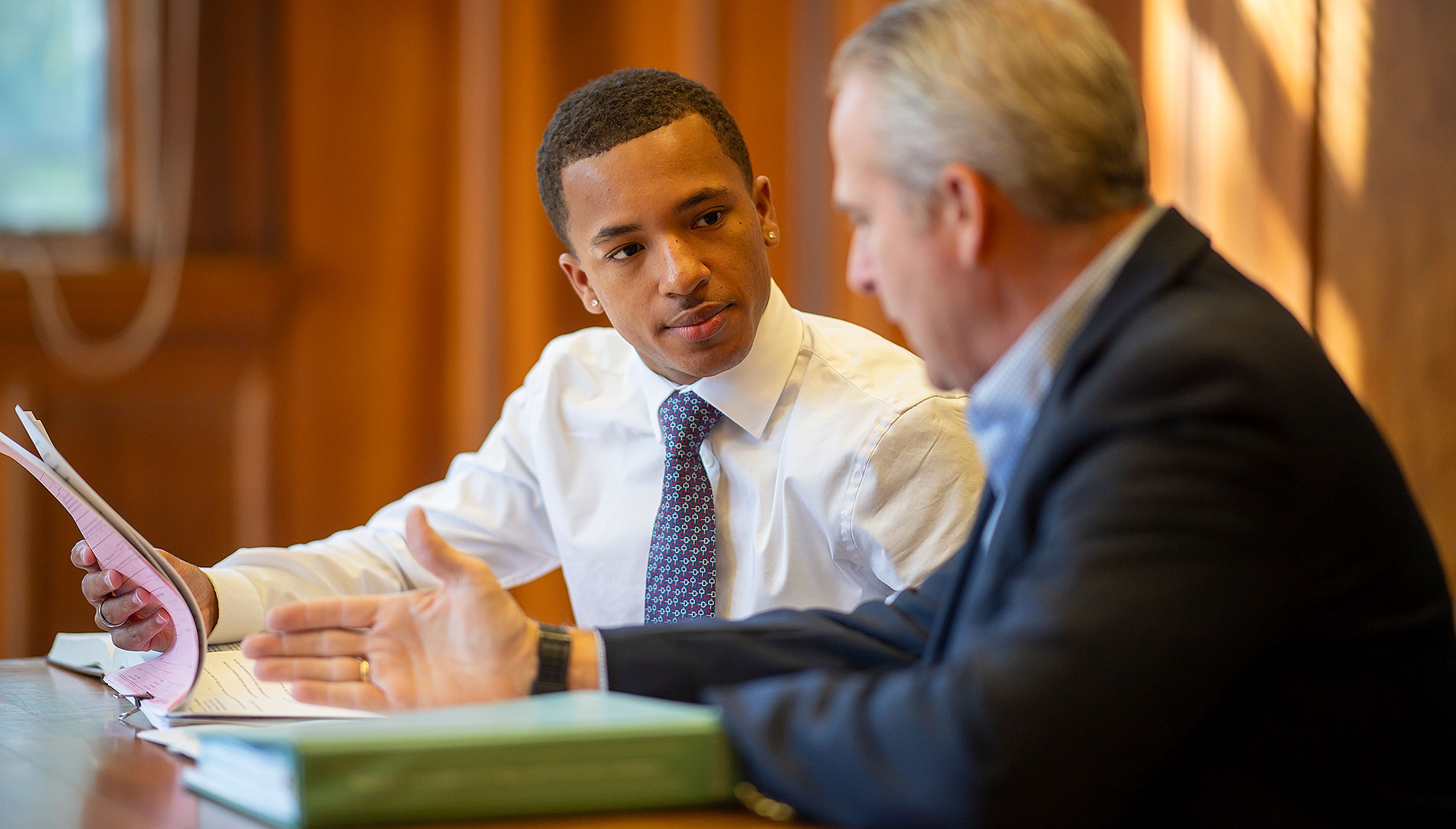 Brandin Carter in meeting with a mentor