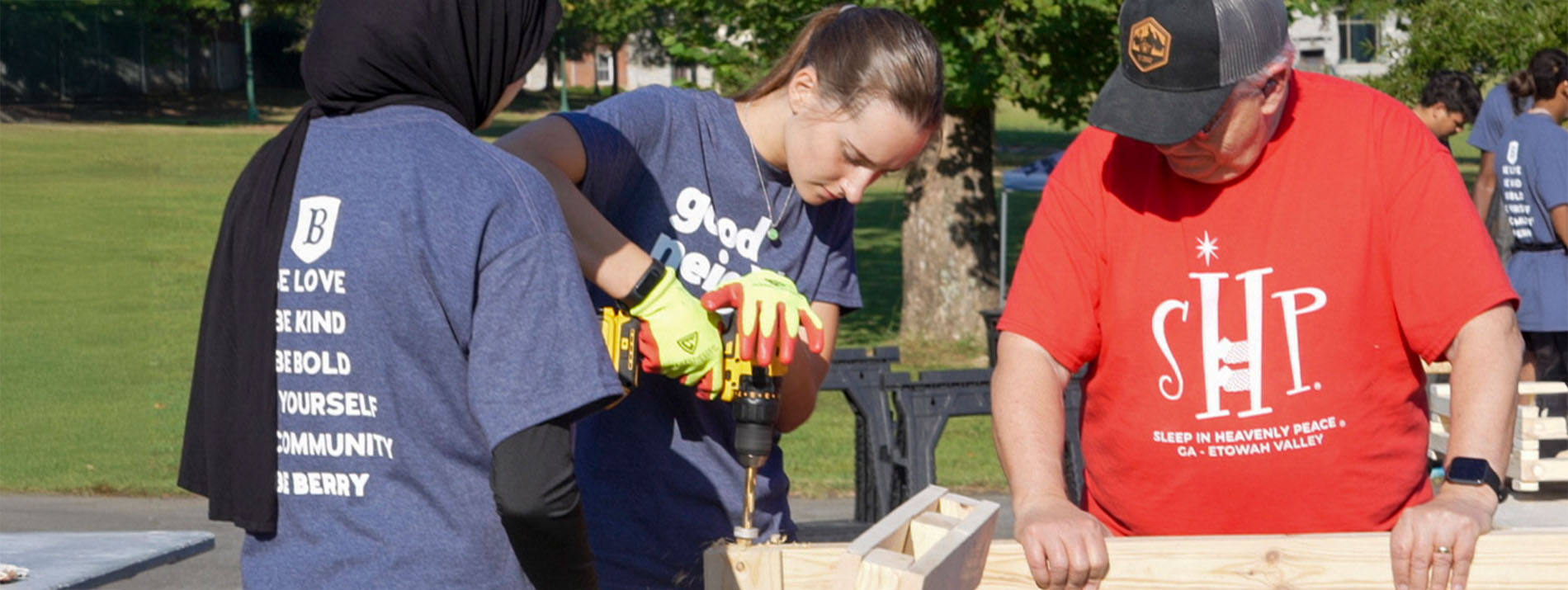 students and community partner woodworking